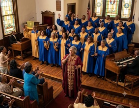 A classic gospel choir in traditional robes