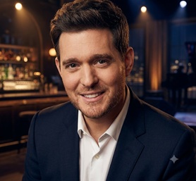 Michael Bubl&eacute; singing with a vintage microphone