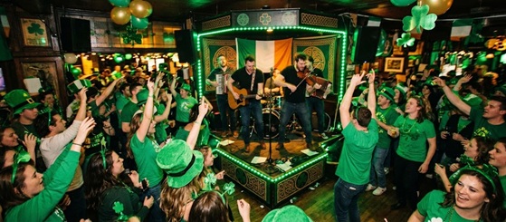 A lively St. Patrick's Day parade with people wearing green