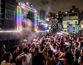 A vibrant, high-energy street party atmosphere