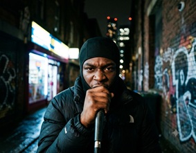 A gritty London street at night